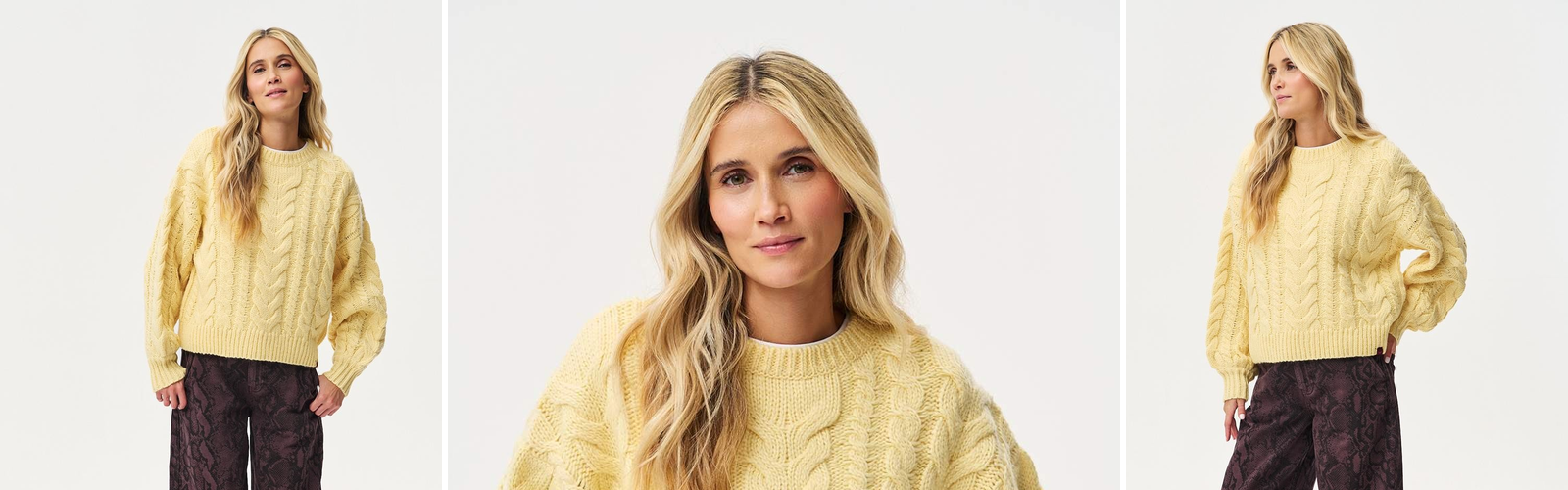 Woman in a pale yellow cable knit sweater, studio photograph