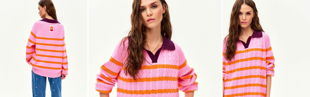 Woman in a colourful striped sweater, an autumn and winter look.