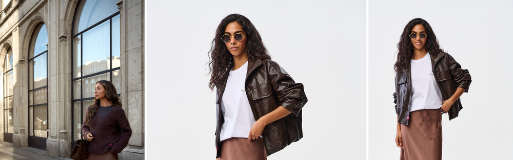 Woman in a brown satin midi skirt and a leather jacket.