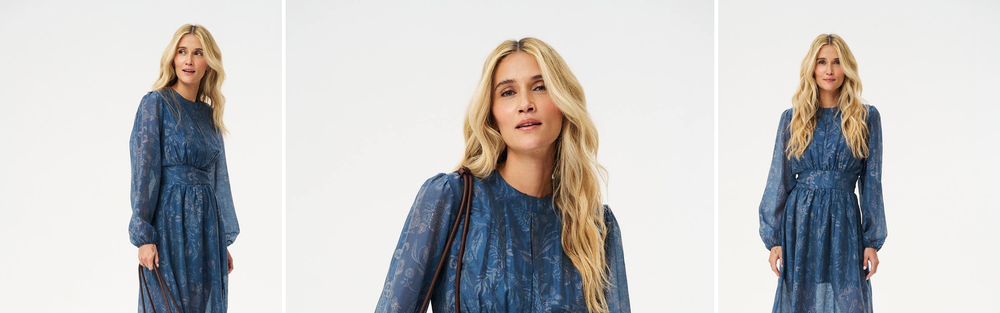 Woman in a blue printed midi dress from the Flowed Romance collection, studio photograph