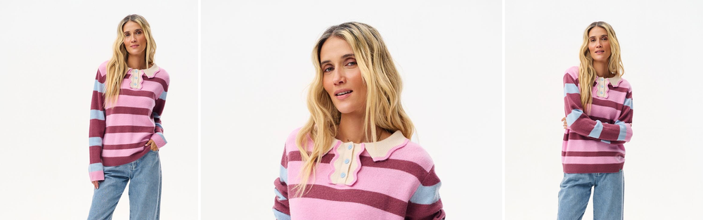 Woman in a striped wool sweater and jeans, studio photograph