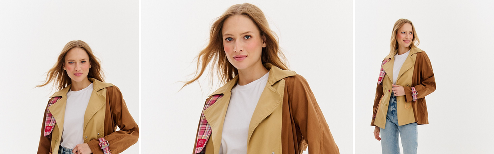 Woman in a short trench coat, studio photograph