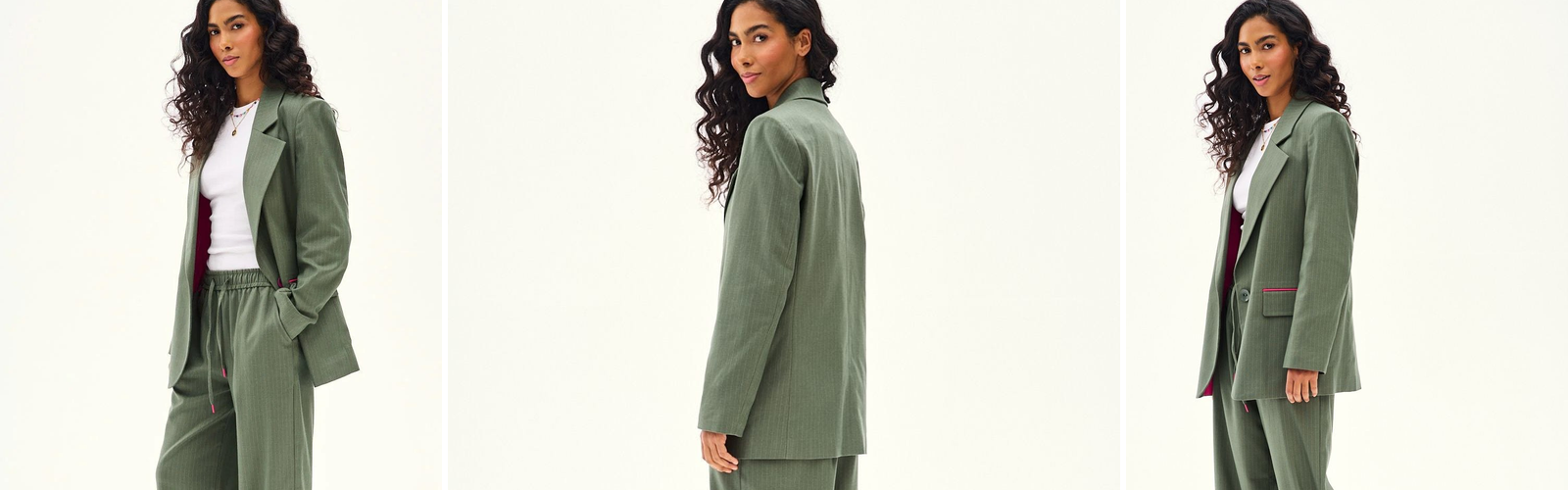 Woman in an olive suit with a blazer and wide trousers, an autumn palette of earthy shades.