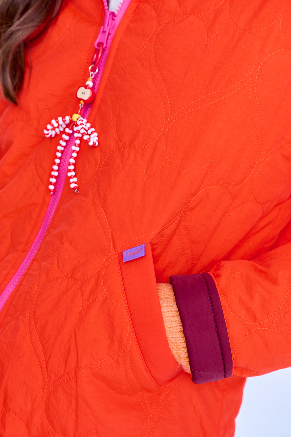 Poppy Loud Love wendbare Jacke mit Kapuze