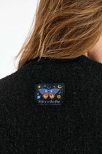 Cardigan Under Dark Sky
