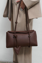 Bitter Chic Leather Baguette Handbag