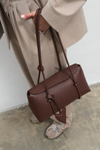 Bitter Chic Leather Baguette Handbag