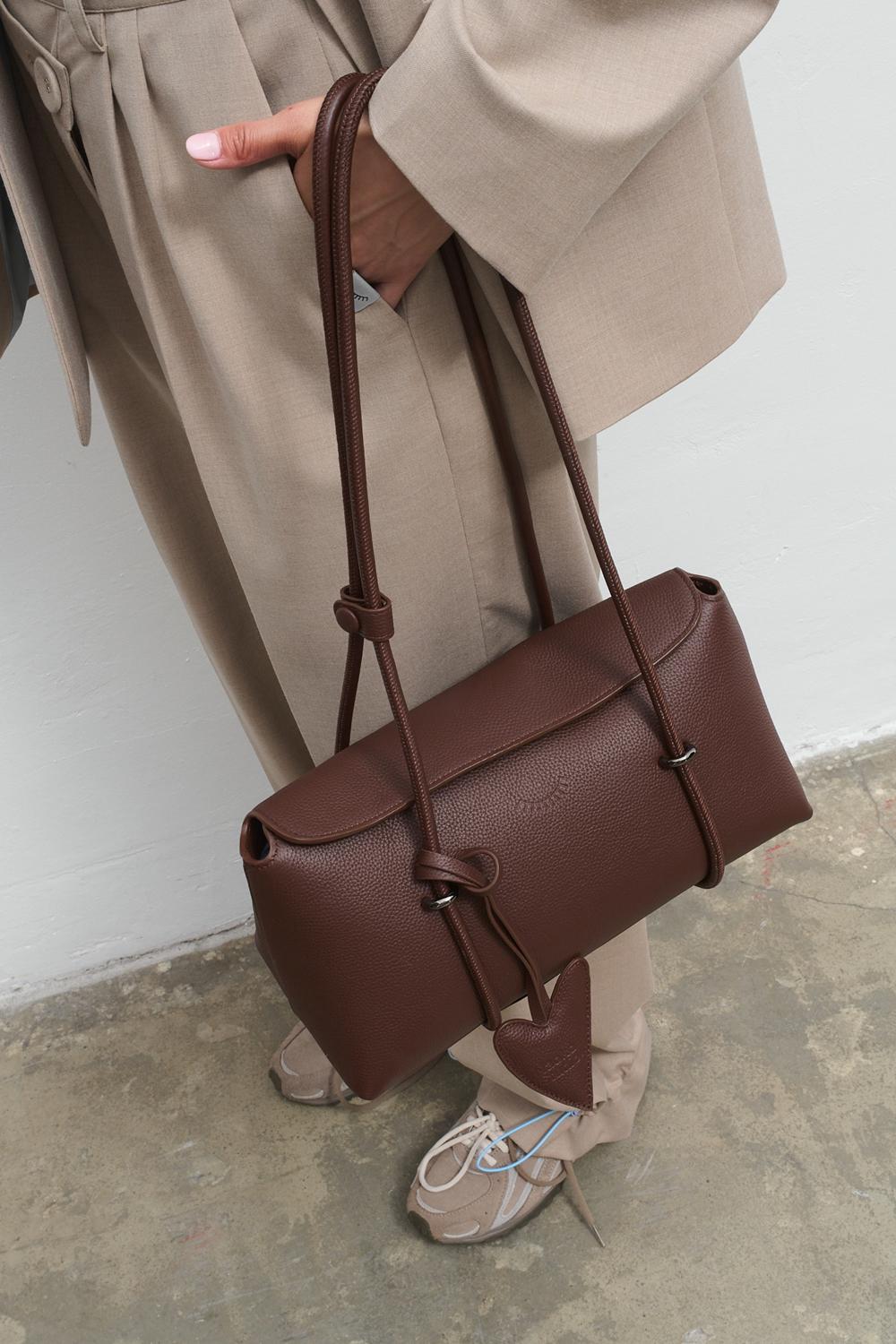Bitter Chic Leather Baguette Handbag