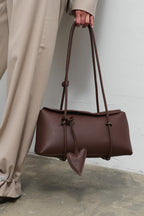 Bitter Chic Leather Baguette Handbag