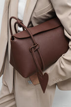 Bitter Chic Leather Baguette Handbag