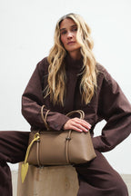 Quiet Agenda Leather Baguette Bag