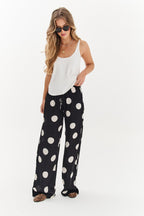 Pantalon large à pois chanceux